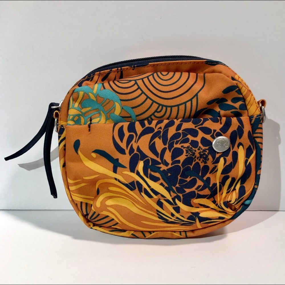 Haiku cross body small purse.